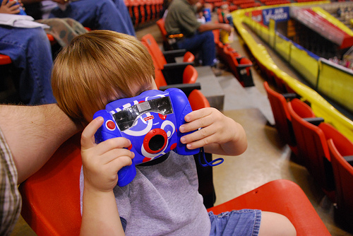 Child taking a photograph
